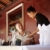 азиатских · официантка · говорить · клиент · ресторан · привлекательный - Сток-фото © diego_cervo