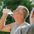 Seniors drinking water after fitness in park stock photo © diego_cervo