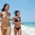 latina sisters in bikini on beach near caribbean sea stock photo © diego_cervo