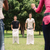 men playing sack race with girlfriends cheering stock photo © diego_cervo