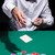 Gentleman in white shirt, playing cards stock photo © Discovod