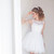 pretty girl in a short white wedding dress stock photo © dmitriisimakov