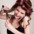 girl with hair curlers talking on the phone and makes the hairstyle stock photo © dmitriisimakov