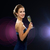 smiling woman holding glass of sparkling wine stock photo © dolgachov