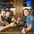 friends taking selfie and drinking beer at bar stock photo © dolgachov