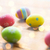 close up of colored easter eggs on wooden surface stock photo © dolgachov