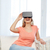 woman in virtual reality headset or 3d glasses stock photo © dolgachov