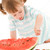 little girl with strawberry and watermelon stock photo © dolgachov