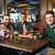 male friends drinking green beer at bar or pub stock photo © dolgachov