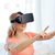 woman in virtual reality headset or 3d glasses stock photo © dolgachov