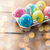 close up of colored easter eggs in egg box stock photo © dolgachov