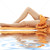 long legs of girl with orange towel on white sand stock photo © dolgachov