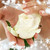 rosebud · flocos · de · neve · bela · mulher · mãos · menina · saúde - foto stock © dolgachov