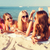 groep · glimlachend · vrouwen · zonnebril · strand · zomervakantie - stockfoto © dolgachov