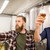 men drinking and testing craft beer at brewery stock photo © dolgachov