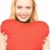 woman with red heart-shaped pillow stock photo © dolgachov