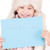 girl in winter hat with blank board stock photo © dolgachov