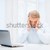 stressed woman with computer stock photo © dolgachov