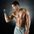 young man with dumbbell stock photo © dolgachov