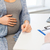 close up of doctor and pregnant woman at hospital stock photo © dolgachov