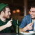 happy male friends drinking beer at bar or pub stock photo © dolgachov