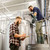 men with clipboard at craft brewery or beer plant stock photo © dolgachov
