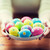 close up of woman hands with colored easter eggs stock photo © dolgachov
