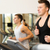 smiling men exercising on treadmill in gym stock photo © dolgachov