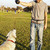 Labrador and Trainer with Dog Chew Toy at Park stock photo © eldadcarin