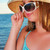 tinilány · visel · kalap · napszemüveg · nyár · tengerpart - stock fotó © elenaphoto