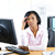 Worried black businesswoman at desk stock photo © elenaphoto