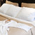 Hotel bed with bathrobe stock photo © elenaphoto
