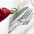 romántica · cena · mesa · aumentó · placas · cubiertos - foto stock © elenaphoto