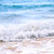Waves breaking on tropical shore stock photo © elenaphoto