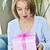 Teenage girl with present stock photo © elenaphoto