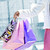 Woman holding shopping bags stock photo © elenaphoto