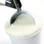Tub of vanilla ice cream with a scoop stock photo © elenaphoto