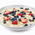 castron · fructe · de · padure · fierbinte · cereale · pentru · micul · dejun · proaspăt - imagine de stoc © elenaphoto