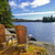 Adirondack chairs at lake shore stock photo © elenaphoto