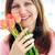 rijpe · vrouw · bloemen · glimlachend · boeket · vrouw - stockfoto © elenaphoto