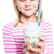 Girl holding ice cream dessert stock photo © ElinaManninen