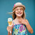 Young girl holding ice cream cone stock photo © ElinaManninen