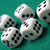 Gambling die on a green surface. stock photo © ElinaManninen