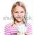 Girl holding ice cream dessert stock photo © ElinaManninen