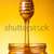 Close-up shot of honey jar with dipper  stock photo © Elisanth