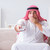 The arab man watching tv at home stock photo © Elnur