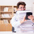 Funny accountant bookkeeper working in the office stock photo © Elnur