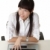 年輕 · 商界女強人 · 工作的 · 辦公室 · 筆記本電腦 · 辦公桌 - 商業照片 © elwynn
