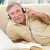 Happy senior man listening to music stock photo © erierika