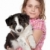 Girl and border collie puppy stock photo © eriklam